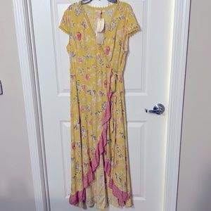 Unique summer dress, pretty detail.  Imported lace, wrap with detailed ruffle.